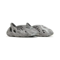 adidas Yeezy Foam RNR MX Granite slip-on in grey marbled EVA foam with sculpted cutouts for ventilation.