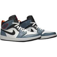 Air Jordan 1 Mid Fearless Facetasm in white leather with blue and navy overlays, orange heel tab, and black Swoosh.