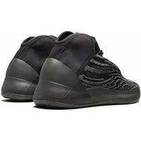 Adidas Yeezy QNTM Onyx with black and grey Primeknit upper, neoprene collar, and a dark semi-translucent midsole.