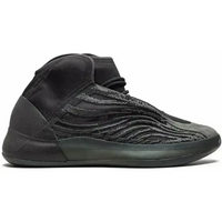 Adidas Yeezy QNTM Onyx sneaker with black Primeknit upper, suede toe cap, and a semi-translucent dark midsole.