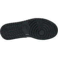 Black rubber outsole of the Air Jordan 1 Low Laser Orange women's sneaker with circular traction pattern.