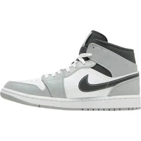 Jordan 1 Mid in Light Smoke Grey, white, and black leather with a side Swoosh and white midsole.