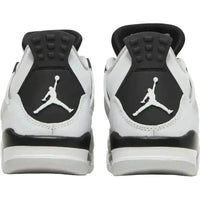 Back view of Jordan 4 Retro Military Black GS sneakers featuring white leather, black heel tabs, and white Jumpman logos.
