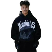 Model wearing a black, heavyweight, cropped Venedictus Dark Haven V2 hoodie with oversized fit and graphic print.