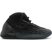 Adidas Yeezy QNTM Onyx with a black Primeknit upper, suede toe cap, and semi-translucent midsole in a high-top silhouette.